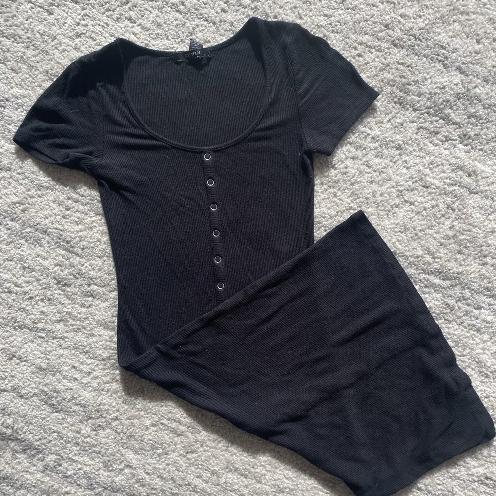 Short sleeve black ribbed mini dress with faux buttons